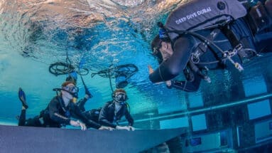Young divers at Deep Dive Dubai experiencing their first dive with the BLU3 Nomad system.