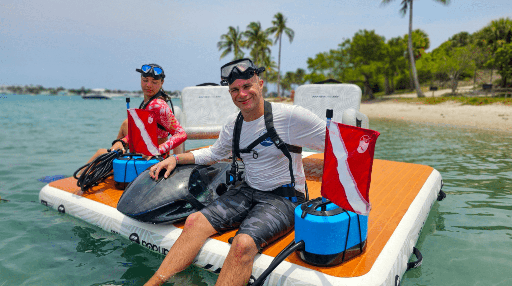 Divers-Prepping-on-POPup-Dock-Tropical-Island-2