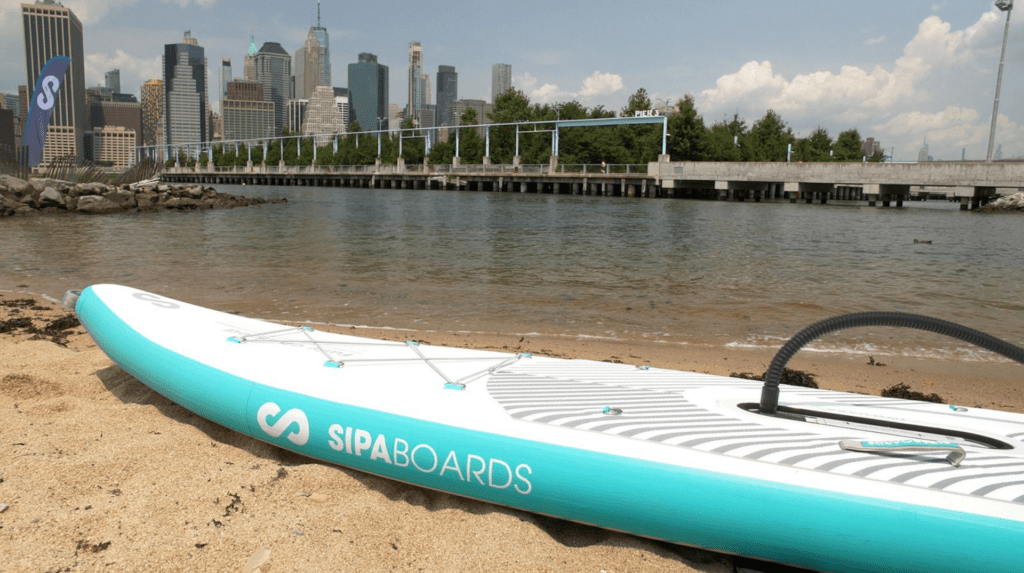 Sipaboard-Built-In-Pump-Motor-Inflating-Paddleboard SipaBoard’s built-in pump inflating the paddleboard; the motor provides 3 knots of propulsion.