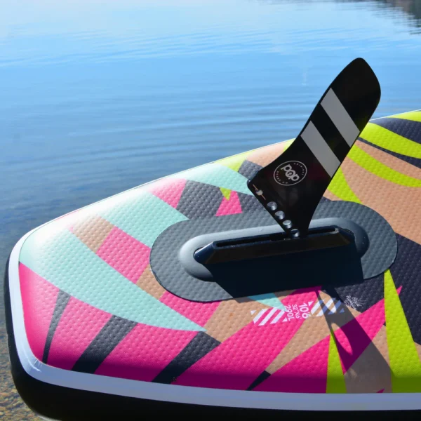 Close-up of the universal fin system on the 10'6 Royal Hawaiian Palm inflatable paddle board by POP Board Co