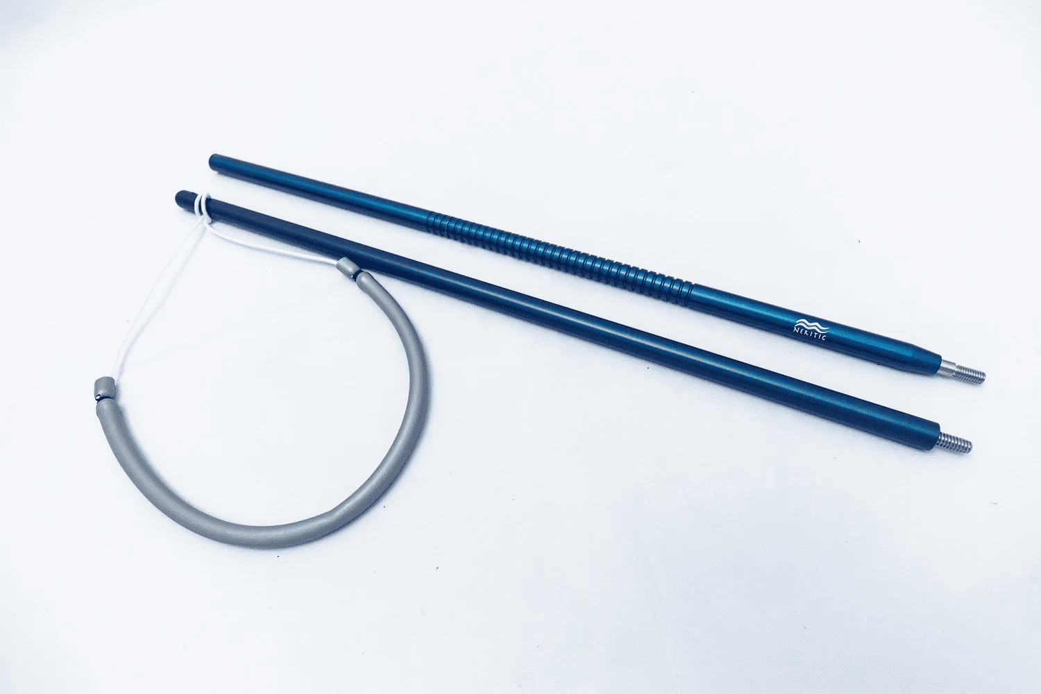 Two-piece Neritic Lionfish Eliminator pole spear with anodized blue aluminum finish and grooved grip.